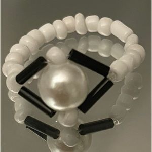 Handmade black and white pearl beaded ring